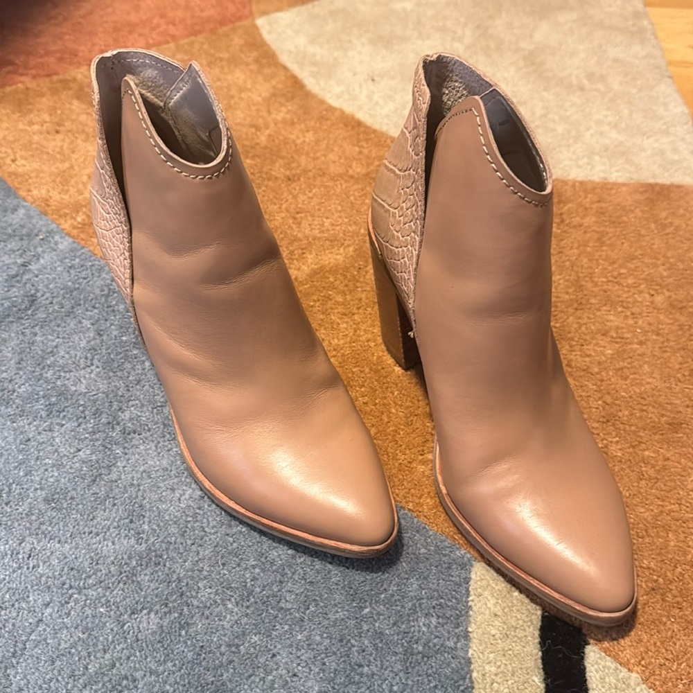 Dolce Vita Tan booties with embossed detail.